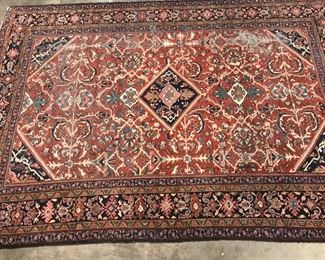 8’9” X 12’4” Red Toned Area Rug