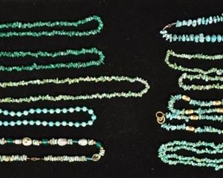 6	Collection of Turquoise and Malachite Necklaces	9 necklaces, 7 made of turquoise and 2 made of malachite. Longest: 18" Length.
