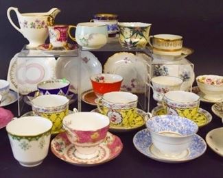 20	Grouping of Porcelain Cups & Saucers	14 cups and saucers, including English Castle, Ohashi, Royal Albert, Rosina, Coalport, Genevieve Lethu, Shafford, Limoges, Thomas, Austrian (chip on cup), Royal Danube; 6 cups without saucers, including Royal Albert, Royal Doulton, Royal Adderley; 5 saucers without cups, including Roslyn, Royal Grafton, Limoges, Delphine; and a Homer Laughlin Georgian creamer.
