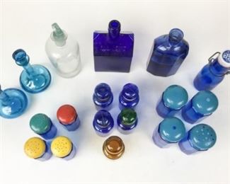 28	Grouping of Glass Shakers & Bottles	19 pieces. Many marked Made in Japan, Made in Taiwan, cobalt, EC Booz's Old Cabin Whiskey bottle. Tallest 8"H including stopper.
