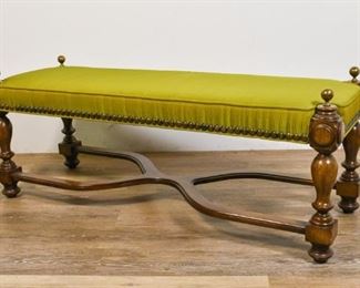65	Italian Style Mid Century Modern Bench	Italian Style Mid Century Modern bench. Late 20th Century. X-style stretcher, brass knob finials, green upholstered cushion with brass studs. Wear to feet and legs. 19" H x 47" L x 17" D
