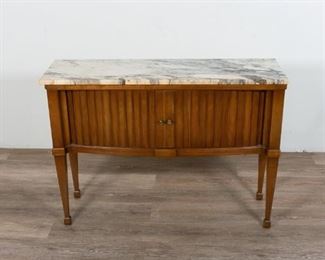 68	Provincial Style Marble Top Tambour Console	Provincial Style marble top tambour console. Mid 20th Century. Italian marble top with tambour doors with brass pulls, spade feet. Wear to front left foot. 29" H x 40" L x 12" D
