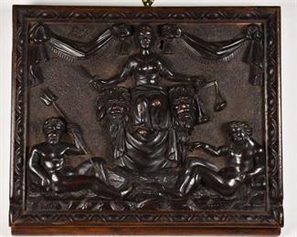 81	Allegorical Walnut Wood Relief Panel	Walnut wood relief panel depicting Themis with Poseidon on her left and Zeus on her right. Circa 19th century. Sight: 14" H x 17" W. Frame: 15" H x 19" W. Loss to the frame, top left. Wear to figures face and extremities.
