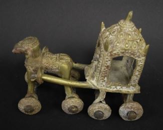 92	Indian Temple Toy	Brass temple toy of horse pulling chariot 5 1/2" Tall 6 1/2" Wide
