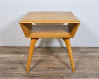 126	Heywood Wakefield Mid Century Modern Night Stand	Heywood Wakefield Mid Century Modern night stand. American, Mid 20th Century. Stamped "HEYWOOD WAKEFIELD" on underside. Open shelf under top of night stand. Wear and stains to top. 26" H x 26" L x 24" D.
