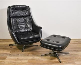 135	Mid Century Modern Eames Style Chair and Ottoman	Mid Century Modern Eames Style chair and ottoman. American, Later 20th Century. Black leather seating, chrome feet. Ottoman spins on pivot. Some wear to legs, seat adjuster is broken. Chair measures 41" H x 29" L x 32" D
