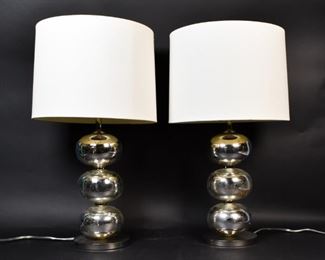 149	Pair of Mercury Glass Lamps	Pair of mercury glass lamps with shades. 28" H x 7" Diameter.
