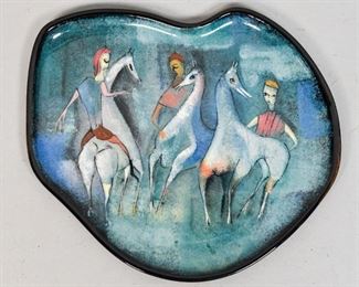150	Polia Pillin Mid Century Plate	Polia Pillin (Polish-American, 1909-1992). A irregular-shaped terracotta plate painted with three people each with a horse. Signed "PILLIN" under glaze on base. Small chip to top left corner. 1" H x 10" L x 9" D
