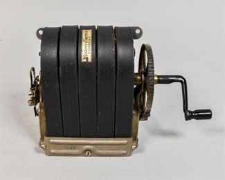 159	Western Electric Manual Crank Generator	Western Electric manual crank generator. American, Late 19th Century. An electric generator which operates by means of a crank. Crank labeled "PATND US". Wear to mechanics and on crank. 6" H x 9" L x 5" D
