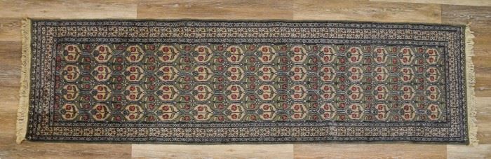 165	Oriental Runner	Oriental runner, green and beige with floral motif. No stains, fraying or tears. 8' 8" x 1' 8 1/2".
