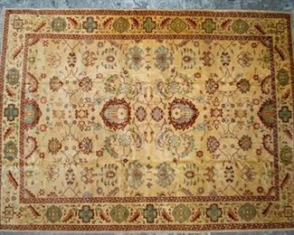 170	Room Size Persian Rug	Room size Persian rug. Symmetrical flame motif center, leaf border. Wear and damage throughout right side. 13'6" x 10'
