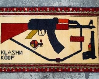 178	Afghan Pictorial War Rug	Afghan war rug, with Kalashnikov. 3'2" x 1'8"
