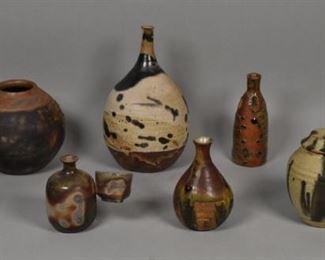 215	Collection of 8 Japanese Bizen Vases and Jars	8 Japanese Bizen pottery vases and jars. Tallest vase: 11 1/2" Height.
