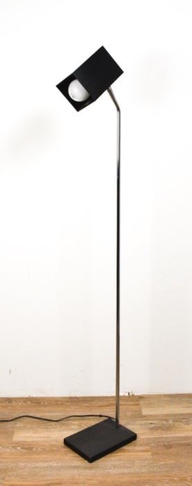231	Mid Century Modern Standing Floor Lamp	Mid Century Modern standing floor lamp. American, Mid 20th Century. Made by Underwriter's Laboratory, label on inside of lampshade. Chrome support, black stone base, black rectangular shade. Lamp has been tested and is in working condition. 49" H x 8" D of base
