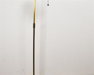 230	Mid Century Modern Standing Floor Lamp	Mid Century Modern standing floor lamp. Mid 20th Century. Brass with bun feet and square base, hooded shade, lamp can extend. Lamp has been tested and works. Some spotting and stains on base. 45" H x 8" diameter of base
