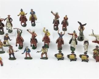 233	Collection of Cowboy Lead Figures	Mostly Timpo Toys England. 27 people, 15 horses, 2 steers, campfire. Tallest figure 3 1/2". Some missing weapons or ropes.
