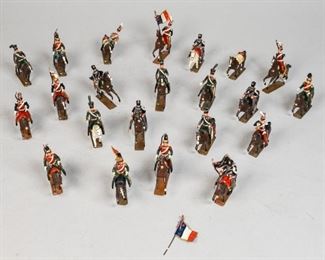 244	C.B.G. France Lead Soldiers	C.B.G. lead soldiers, stamped "Made in France". 22 horses and 21 soldiers, French flag, and box for soldiers, marked "Hussards Autrichiens 4th Reg 1813".
