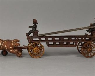 251	Cast Iron Horse Drawn Fire Engine	Cast iron horse drawn fire engine, with two horses, two firemen and a ladder. 14 3/4" Length.
