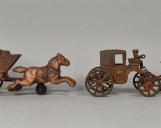 253	2 Cast Iron Horse Drawn Carriages	2 cast iron horse drawn carriages. Largest: 9 1/2" L x 4 1/2" H.
