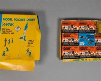 258	Cub Scout Model Rocket Derby Activity Kits	Cub Scout model rocket derby activity kits. American, 1960s. A model rocket derby "8-Pak" containing enough supplies to make 8 flying model rockets, and engine "pak 24" containing 8 model rocket engines and a box of parachute wadding. Wear and warping to both boxes. 3" H x 9" L x 9" D
