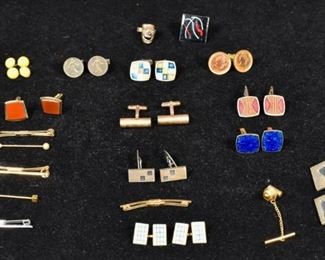 291	Grouping of Cufflinks and Men's Accessories	Grouping of cufflinks and men's accessories. Early to Mid 20th Century. 6 tie clips, a tie pin on chain, and 22 cuff links, including 7 sterling. Sterling 49.6 grams. Tie clip 2"
