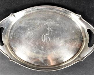 304	Gorham Sterling Silver Serving Tray	Gorham serving tray. Marked on the underside " A4609 J.E Caldwell & Co". 14 1/2" L x 9 1/4" W. 633.4 grams total.
