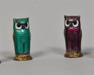 
308	4 David Andersen Sterling & Enamel Owl Salts	David Andersen (Norway, 1876-). 2 pair of sterling silver and enamel owl form salt and peppers. All marked D-A Norway Sterling 925 S on the underside. Each 2 1/8"H. Some losses to gold wash patina on all.
