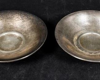 318	Pair of Towle Sterling Bon Bon Bowls	Towle Silversmiths (American, Massachusetts, 1882-). Pair of sterling silver bon bon bowls, in the Silver Flutes pattern. Both marked Towle Sterling, with Towle lion and T maker's marks on the underside. Each 1 3/8"H x 6"-diameter. 239.4 grams total.

