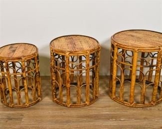 322	Three Chinese Bamboo Nesting Side Tables	Three Chinese bamboo nesting tables. Chinese, Mid 20th Century. Circular tables, arches and supports formed by bent and manipulated bamboo. Slight fraying to weaving of each table. 19" H x 17" D
