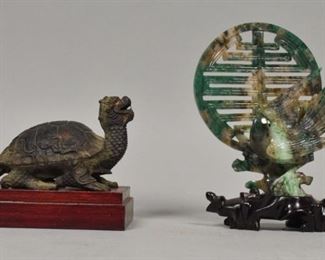 362	Chinese Nephrite Jade Statue and Dragon Turtle	Chinese nephrite jade statue with the symbol "Shou" and a hawk. Metal Chinese dragon turtle with wood stand. Dragon turtle with stand: 4" L x 2 3/4" W x 3 3/4" H Nephrite jade statue with stand: 6" H x 3 3/4" Diameter.
