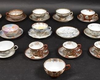 369	18 Japanese Satsuma Porcelain Cups and Saucers	18 Japanese Satsuma eggshell porcelain cups and saucers. 1 mismatched. Saucer: 5 1/2" Diameter. Cup: 1 7/8" H x 3 3/4" Diameter. Chip to the rim of 1 cup.
