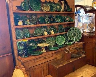 New pine cabinet with wonderful Majolica pieces.