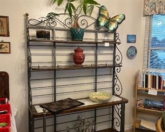 Large metal baker's rack with 1 marble and 3 wood shelves. 