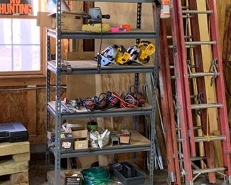 Variety of DeWalt and Milwaukee power tools, electric and air powered