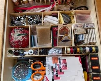 Table full of sewing notions. 