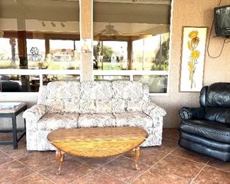 Black Lazyboy recliner and a sleeper sofa