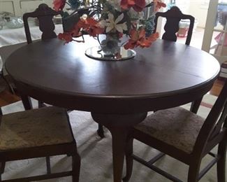 This antique dining room furniture is original to the home.  Table has 3 leafs, & 6 chairs