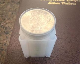  ROLL OF SILVER DOLLARS