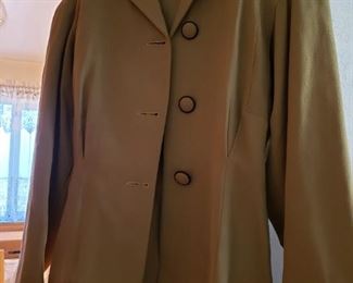 We have a whole closet from the 1940's to the 2000's. This is a classic suit from the 1940/1950's.