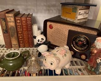 Antique books, book ends, piggy bank, antique radio