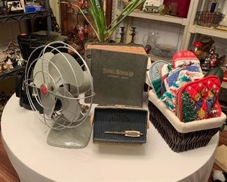 Vintage fan, radio, pot holders, turn of the century Buhl and Sons Detroit catalogue (very cool book with illustrations of almost anything you could think of purchasing at that time)