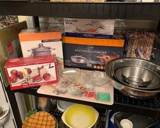 Stainless mixing bowls, apple peeler, cutting boards, pots/pans