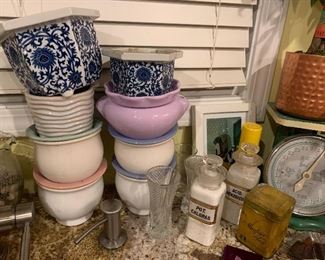 African violet parts, vintage tins