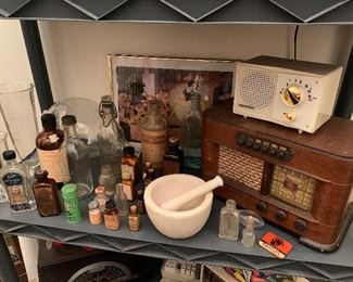 Wood Philco tube radio, pharmacy bottles, Disney picture