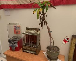 1920’s gum and mint machine, gum ball machine, plant