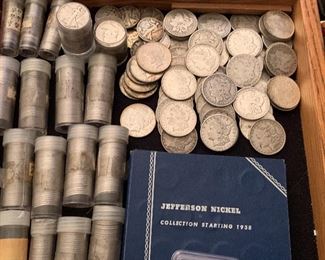 Over 800 silver coins including but not limited to Morgan Dollars, Walking Liberty, Washington Quarters, Mercury Dimes, and more