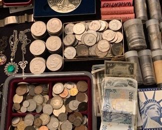 Foreign paper currency, Ike silver dollars, Kennedy half dollars, hundreds of foreign coins, wheat pennies