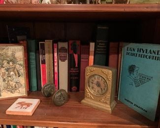 Vintage books, clock, ornate door knob 