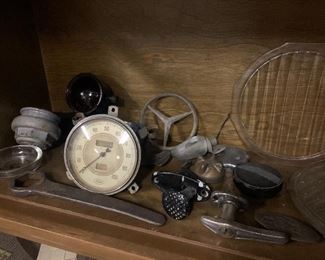1920’s Cadillac wrench, Mercedes emblem, 1940’s speedometer 