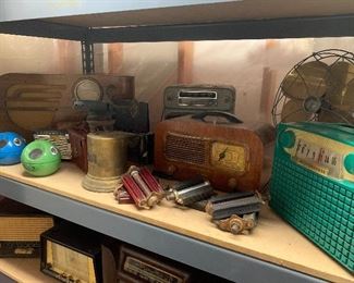 Antique bicycle pedals, radios, 1950’s Buick radio, brass fan